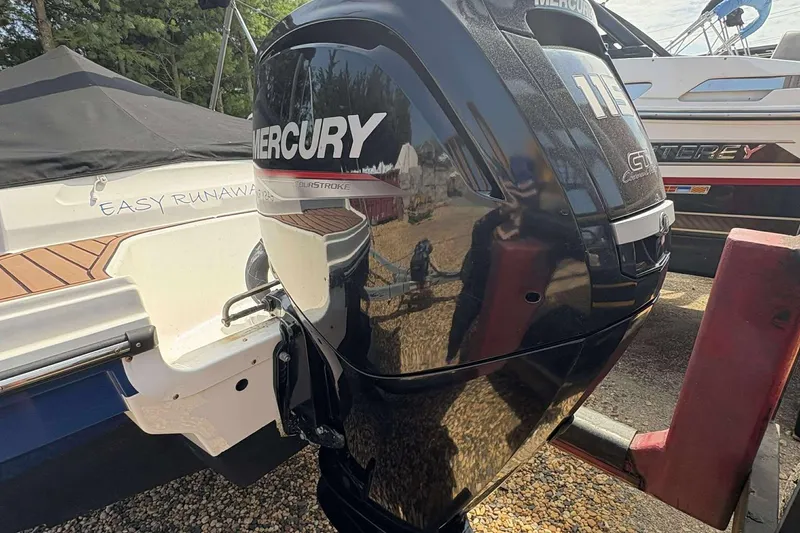 Slide: The Image of 2020 Bayliner VR4 Bowrider OB with Mercury outboard engine, parked outdoors. - 17