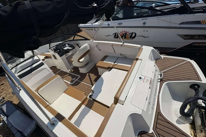 Slide: The Image of 2020 Bayliner VR4 Bowrider OB with spacious seating and modern interior design. - 5