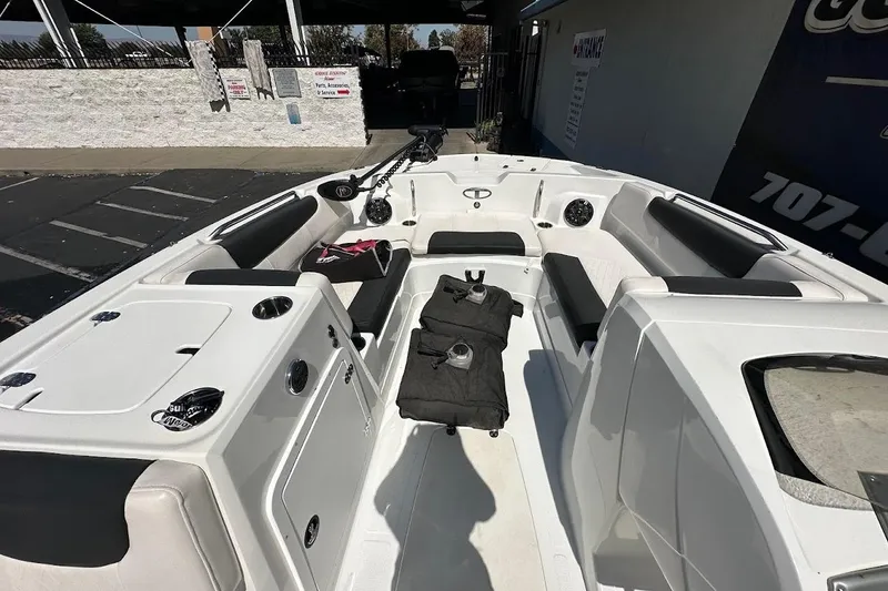 Slide: The Image of 2019 Tahoe 2150 boat interior with seating and storage compartments. - 20