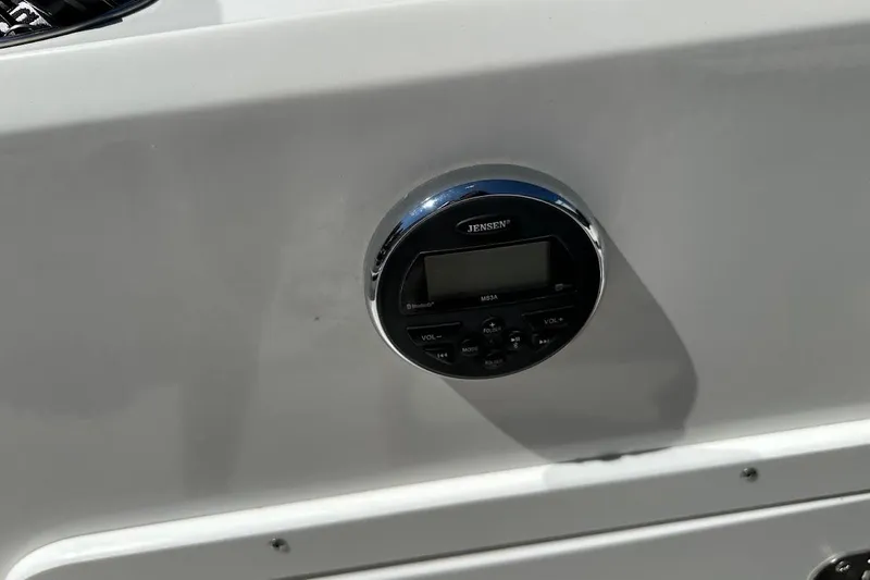 Slide: The Image of Jensen audio system on 2019 Tahoe 2150 boat dashboard. - 26