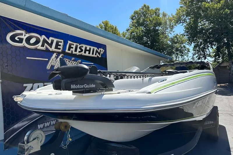 Slide: The Image of 2019 Tahoe 2150 boat with MotorGuide, displayed at Gone Fishin' Marine dealership. - 5