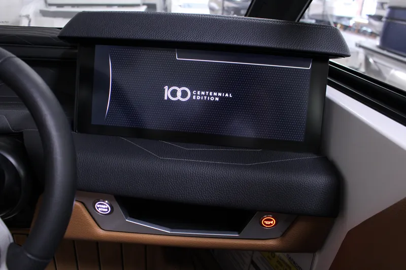 Slide: The Image of 2025 Nautique Super Air G23 dashboard with Centennial Edition display. - 9