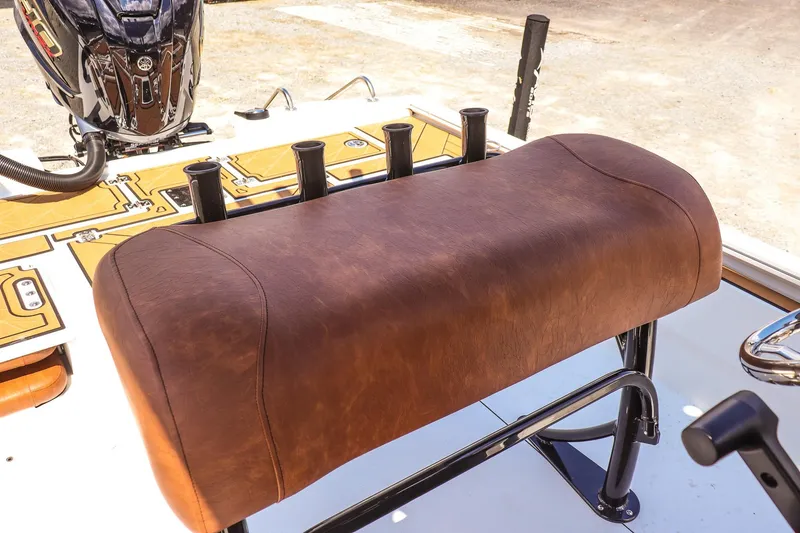 Slide: The Image of Leather seat on 2026 Avid 23 Fusion boat with rod holders and Yamaha engine. - 10