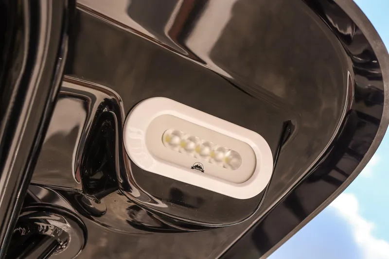 Slide: The Image of LED light on Avid 23 Fusion boat, 2026 model, with sleek black finish. - 16