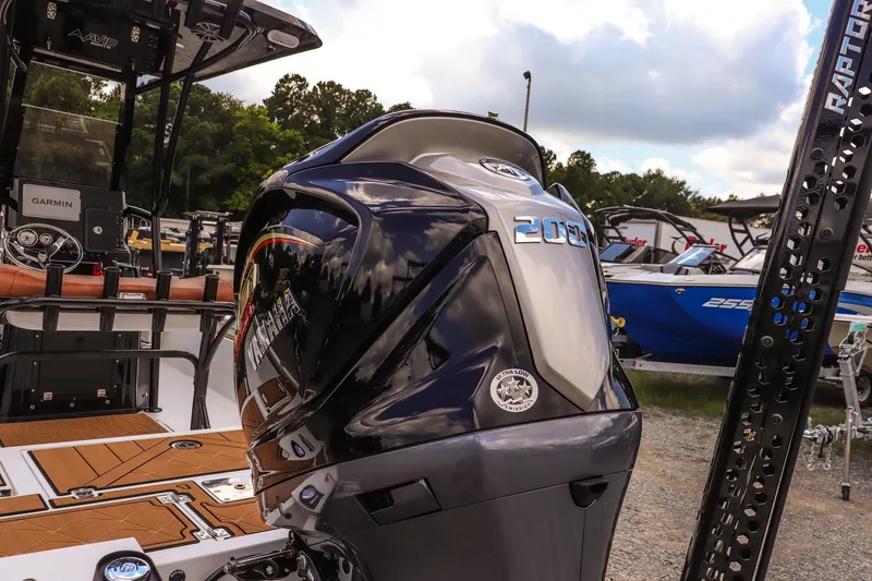 Slide: The Image of 2026 Avid 23 Fusion boat with Yamaha engine, featuring Garmin electronics and Raptor accessories. - 28