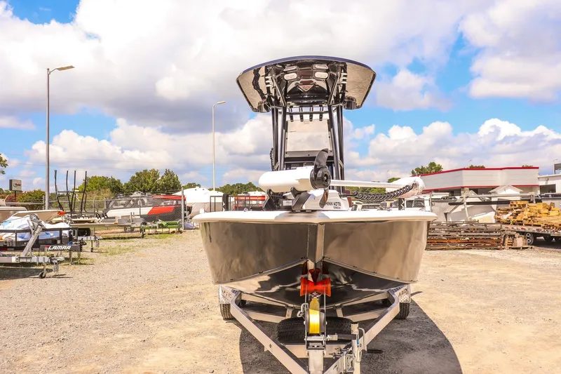 Slide: The Image of Avid 23 Fusion 2026 boat on trailer under blue sky with clouds. - 8