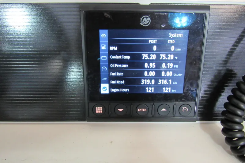 Slide: The Image of Dashboard display of a 2019 Boston Whaler 270 Dauntless showing engine metrics. - 14