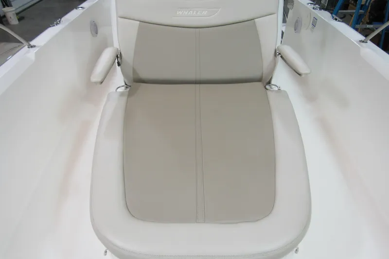 Slide: The Image of 2019 Boston Whaler 270 Dauntless boat seat, beige upholstery, comfortable design. - 17