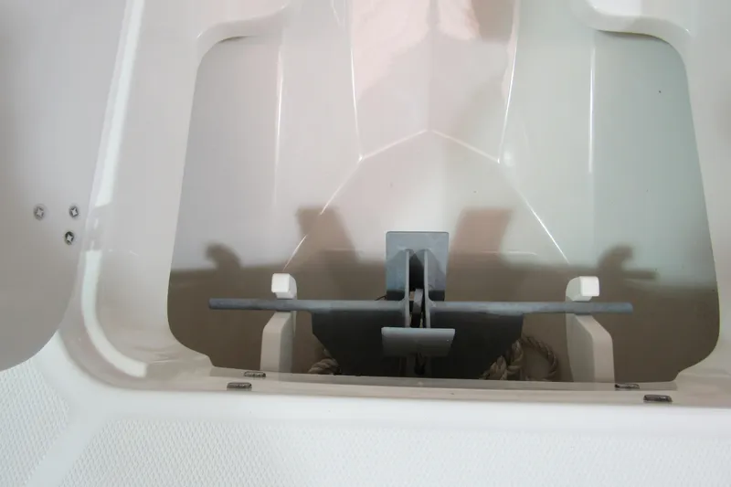 Slide: The Image of Anchor storage compartment on a 2019 Boston Whaler 270 Dauntless boat. - 25