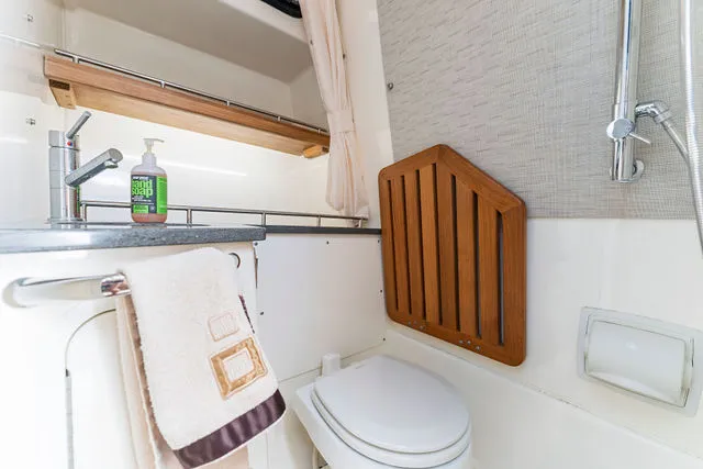 Slide: The Image of 2019 Boston Whaler 270 Dauntless boat interior with cushioned seating area. - 44