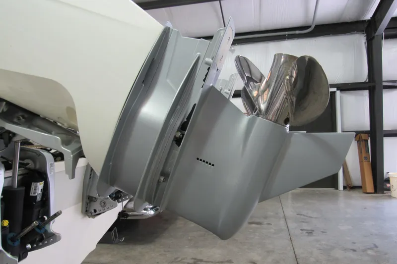 Slide: The Image of 2019 Boston Whaler 270 Dauntless boat engine and propeller in a garage. - 7