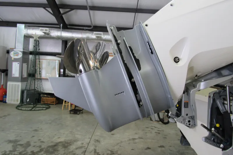 Slide: The Image of 2019 Boston Whaler 270 Dauntless boat engine detail in a workshop setting. - 8