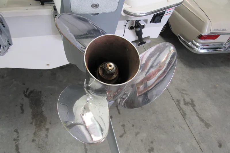 Slide: The Image of Close-up of a 2019 Boston Whaler 270 Dauntless boat propeller in a garage. - 9