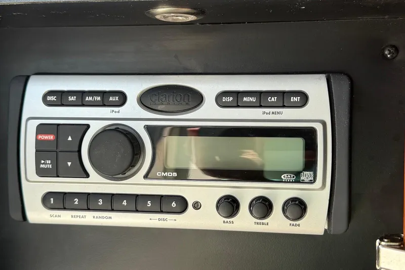 Slide: The Image of Clarion Marine CMD5 stereo system on 2009 Sea Ray 270 Sundancer boat dashboard. - 24