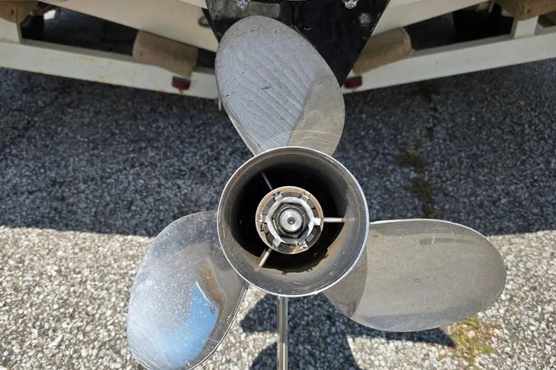 Slide: The Image of Close-up of a boat propeller from a 2002 Rinker 212 Captiva BR. - 10