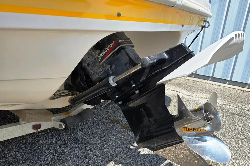 Slide: The Image of 2002 Rinker 212 Captiva BR boat with Mercury outboard motor and Turbo propeller. - 9