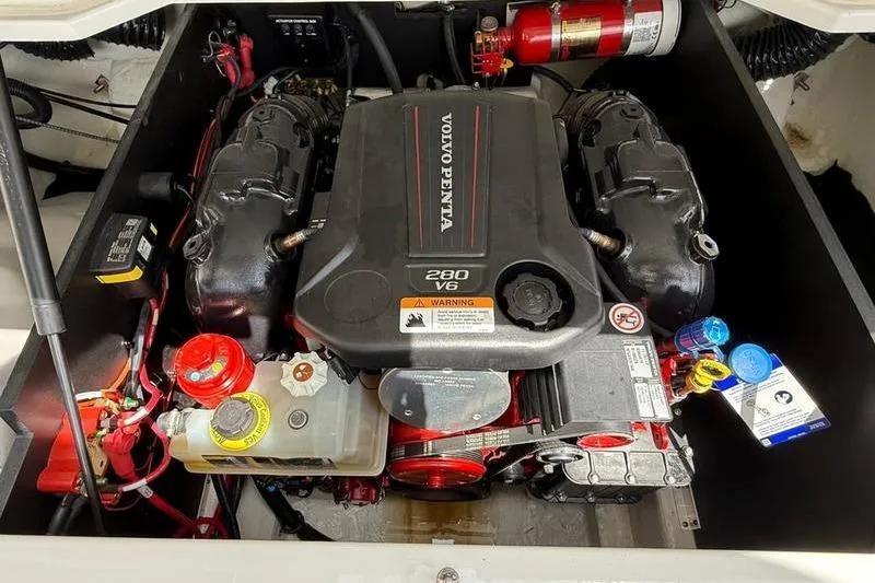 Slide: The Image of 2023 Regal LS2 engine compartment featuring a Volvo Penta 280 V6 engine. - 12