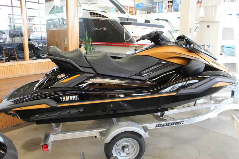 Slide: The Image of 2025 Yamaha FX Cruiser High Output jet ski in showroom on trailer. - 3
