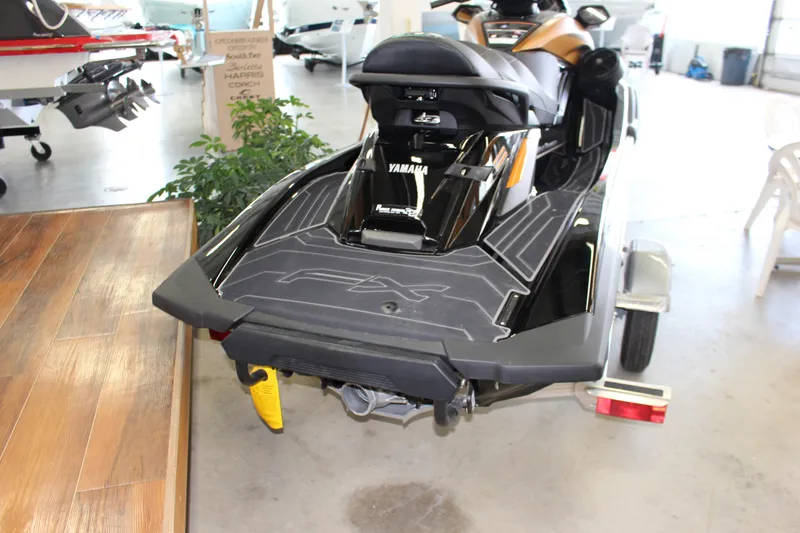 Slide: The Image of 2025 Yamaha FX Cruiser High Output jet ski on display in showroom. - 7