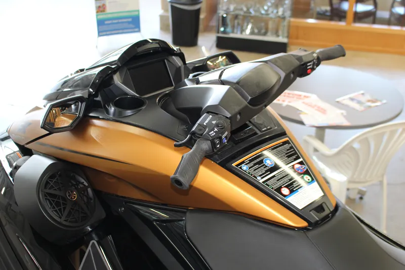 Slide: The Image of 2025 Yamaha FX Cruiser High Output jet ski with sleek design and advanced controls. - 8