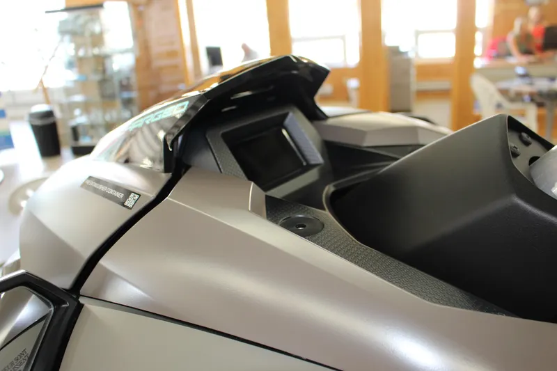 Slide: The Image of 2025 Yamaha GP 1800 SVHO dashboard and controls in a showroom setting. - 5