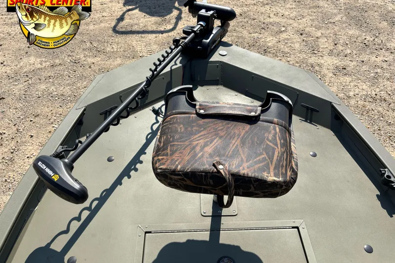 Slide: The Image of 2019 Tracker Grizzly 1754 SC boat with camo seat and trolling motor. - 6