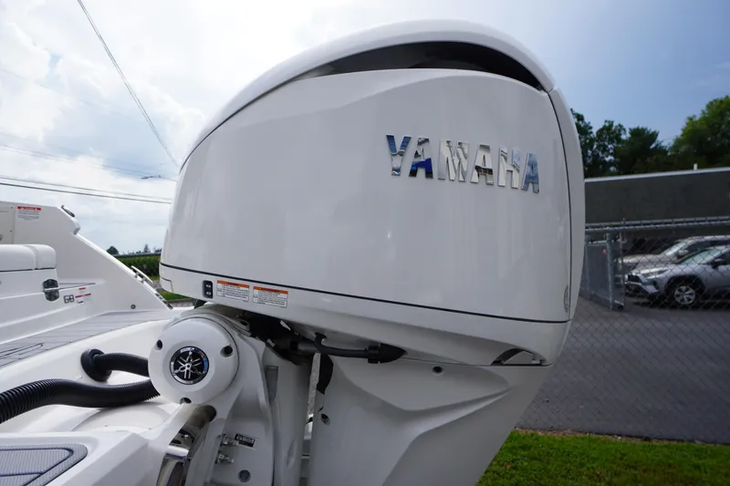 Slide: The Image of 2025 Chaparral 280 OSX with Yamaha outboard engine, showcasing sleek design and power. - 9