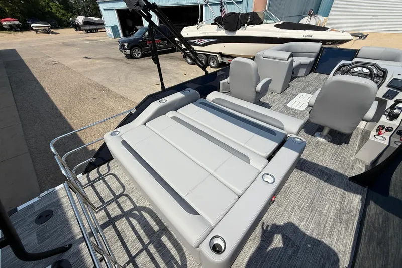 Slide: The Image of 2026 Bentley Pontoons Legacy 223 Swingback with luxurious seating and modern design. - 25