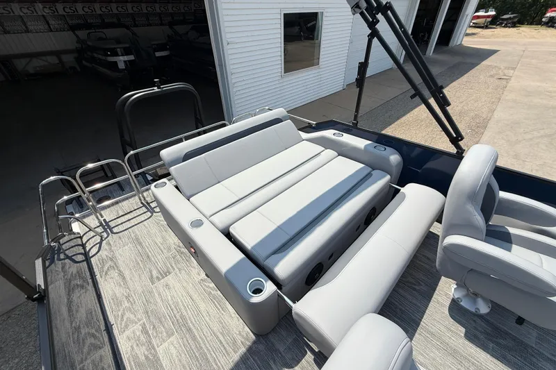 Slide: The Image of 2026 Bentley Pontoons Legacy 223 Swingback with luxurious seating and modern design. - 26