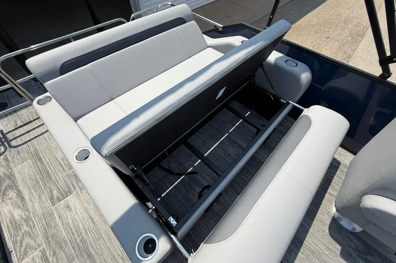 Slide: The Image of 2026 Bentley Pontoons Legacy 223 Swingback interior seating with gray upholstery and cup holders. - 27