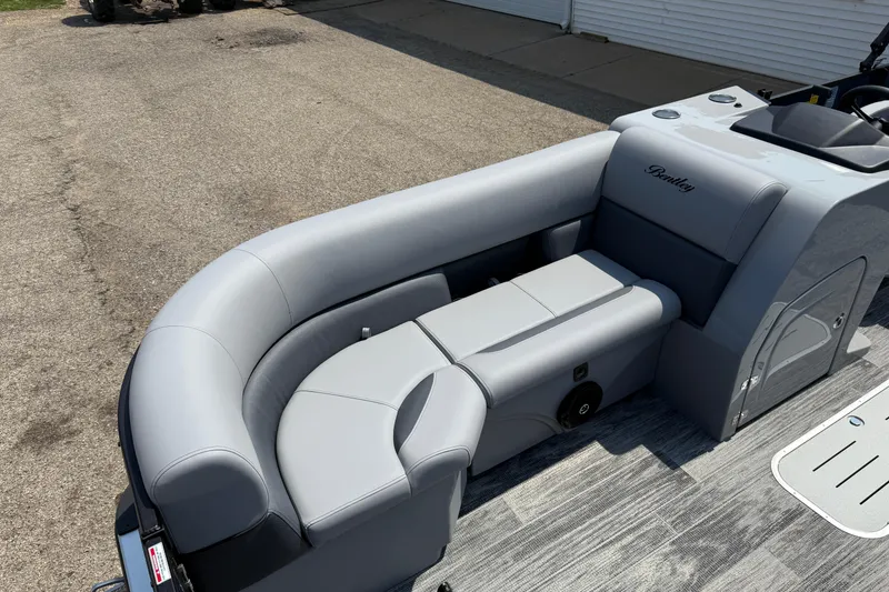 Slide: The Image of 2026 Bentley Pontoons Legacy 223 Swingback with sleek gray seating and modern design. - 9