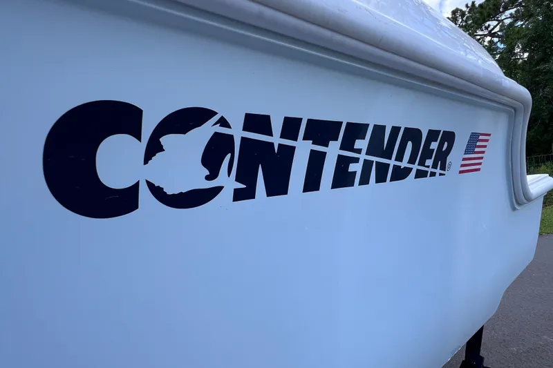 Slide: The Image of 2017 Contender 24 Sport boat with logo and American flag decal. - 13