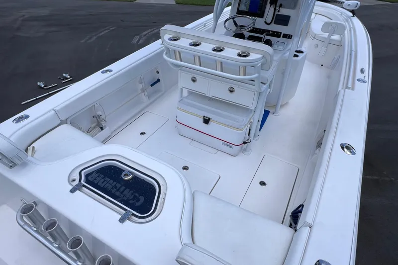 Slide: The Image of 2017 Contender 24 Sport boat interior with seating and storage compartments. - 16