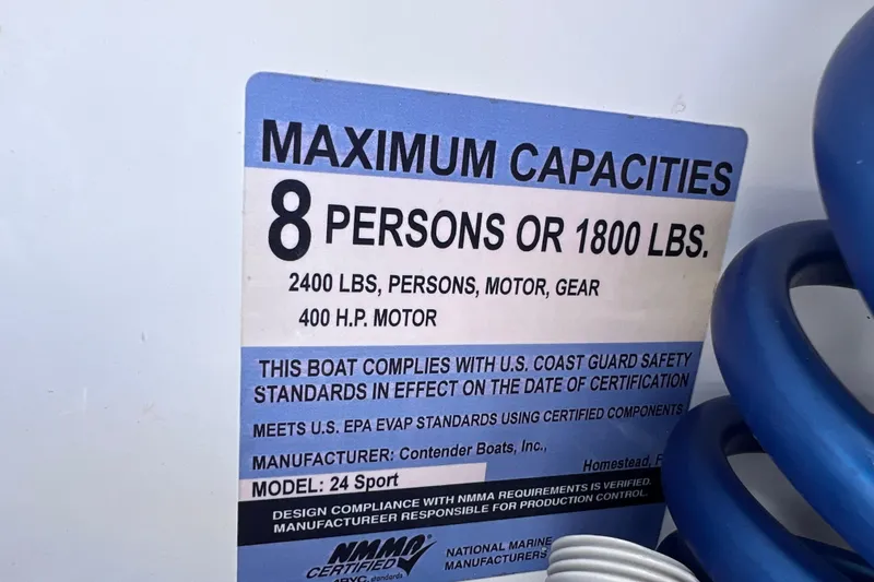 Slide: The Image of 2017 Contender 24 Sport boat capacity label, 8 persons or 1800 lbs, 400 HP motor. - 23