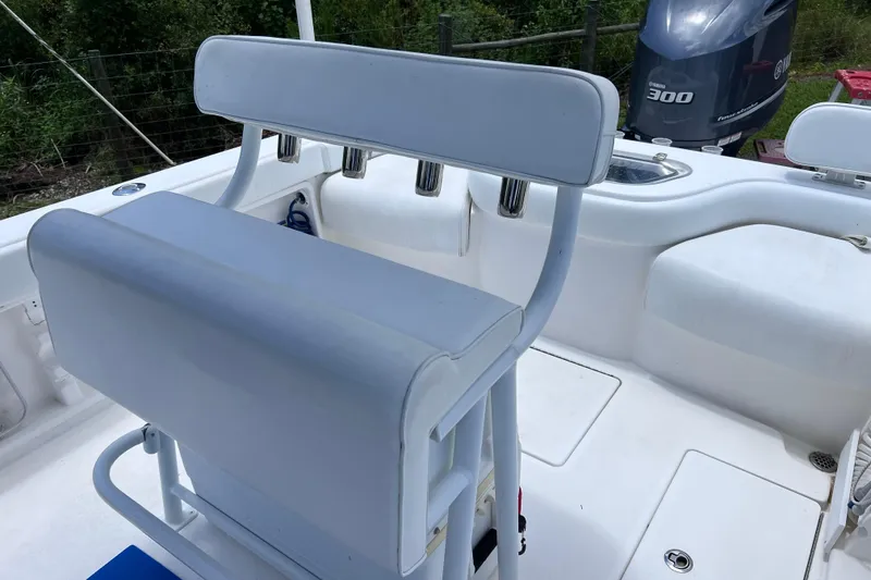 Slide: The Image of 2017 Contender 24 Sport boat interior with seating and Yamaha 300 outboard motor. - 26