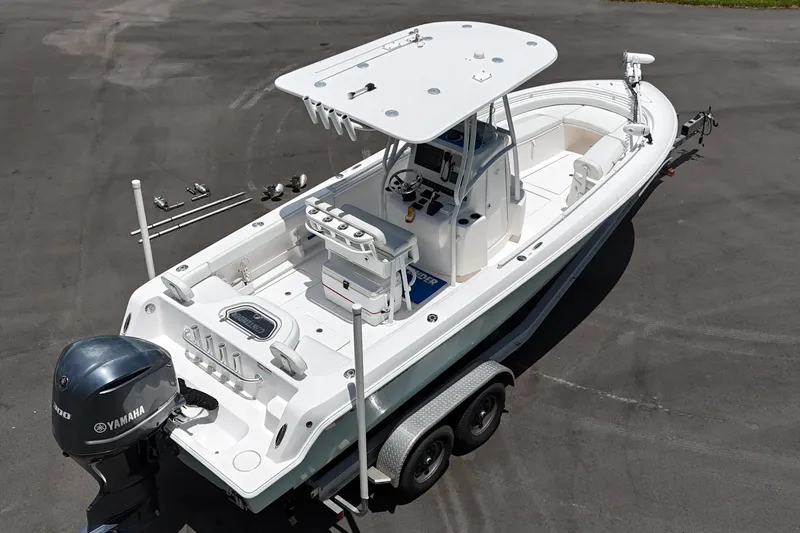 Slide: The Image of 2017 Contender 24 Sport boat on trailer with Yamaha outboard motor, aerial view. - 3