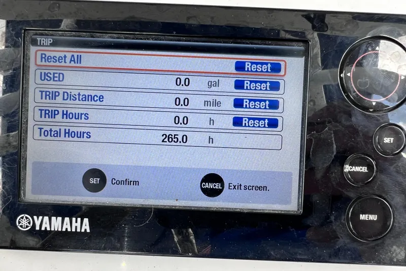 Slide: The Image of Yamaha display showing trip data and total hours for 2017 Contender 24 Sport. - 52