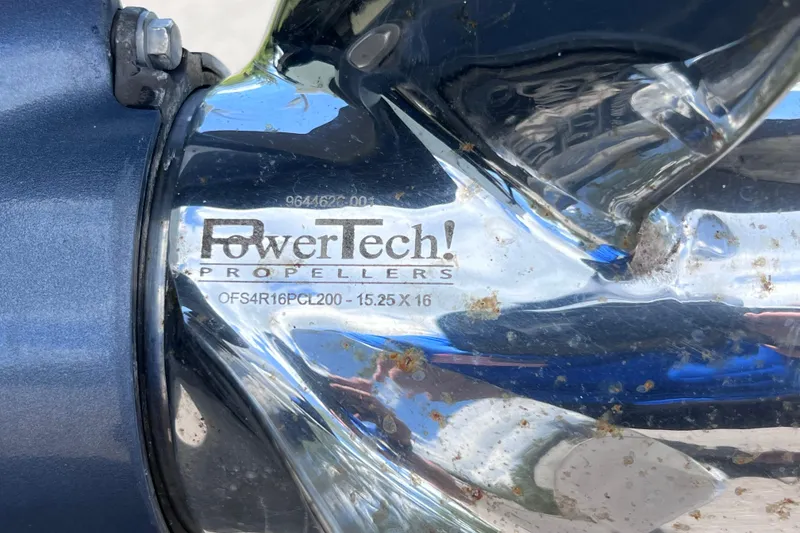 Slide: The Image of Close-up of a PowerTech propeller on a 2017 Contender 24 Sport boat. - 57
