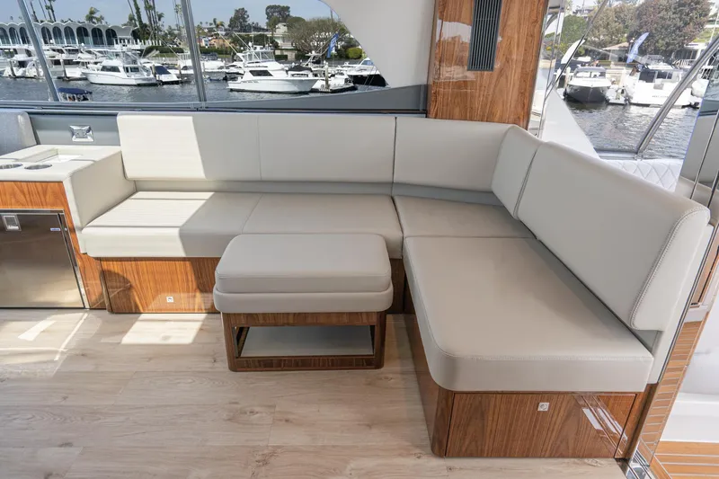 Slide: The Image of Luxurious interior of 2023 Riviera 64 Sports Motor Yacht with modern kitchen and panoramic windows. - 19