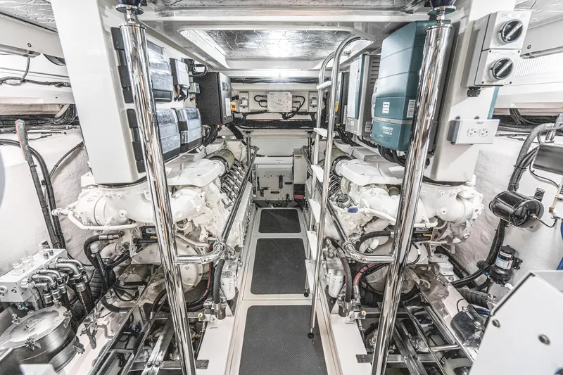 Slide: The Image of Luxurious bathroom in 2023 Riviera 64 Sports Motor Yacht with modern fixtures and wood accents. - 44