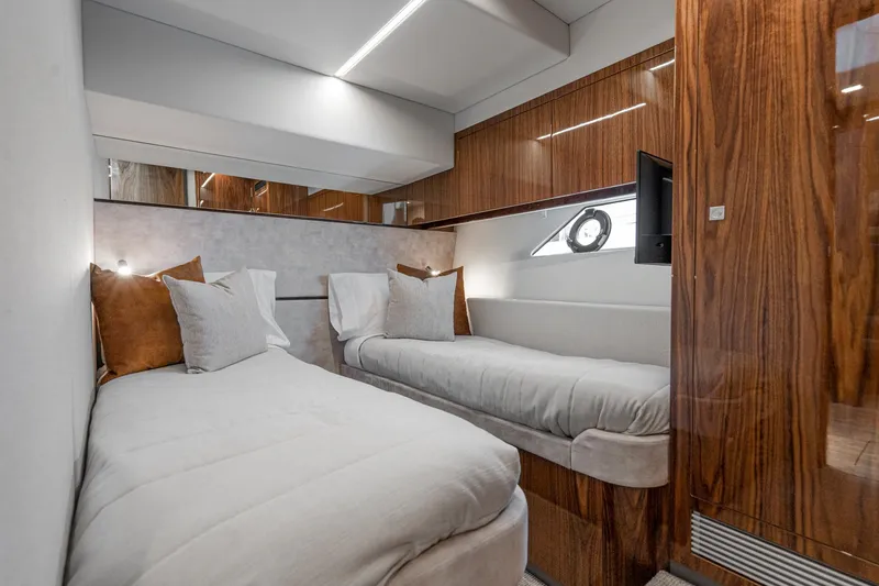 Slide: The Image of Luxurious interior of 2023 Riviera 64 Sports Motor Yacht bedroom with modern design. - 49