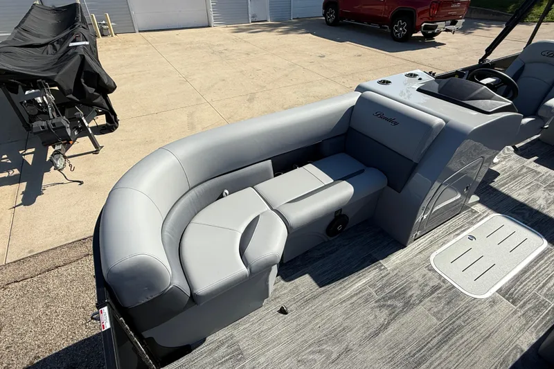 Slide: The Image of 2026 Bentley Pontoons Legacy 223 Swingback with sleek gray seating and modern design. - 11