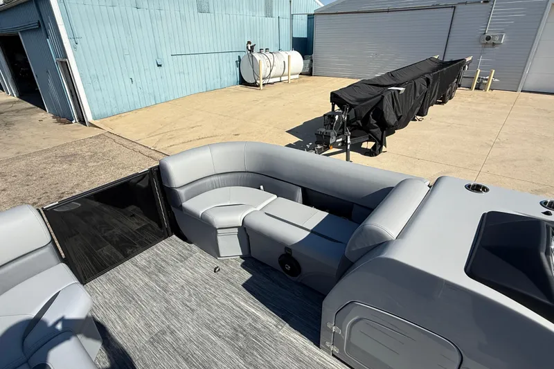 Slide: The Image of 2026 Bentley Pontoons Legacy 223 Swingback interior with gray seating and modern design. - 12