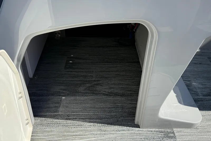 Slide: The Image of Interior view of 2026 Bentley Pontoons Legacy 223 Swingback, showcasing storage compartment. - 18