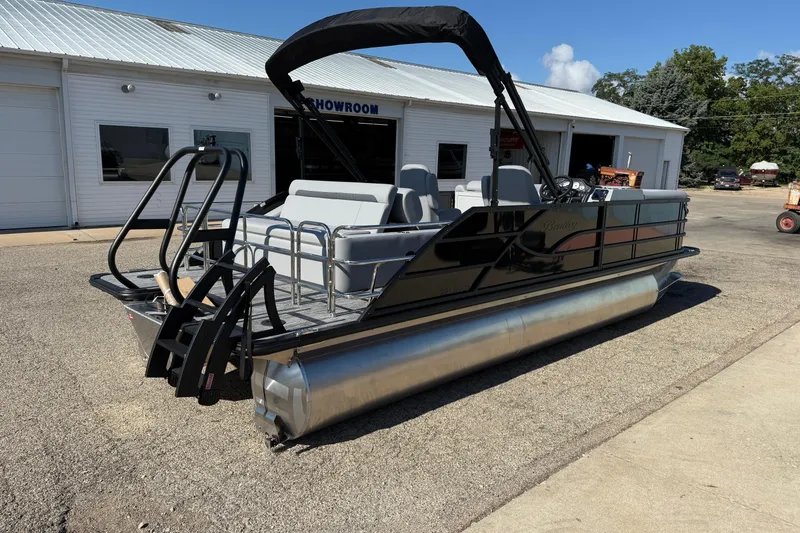 Slide: The Image of 2026 Bentley Pontoons Legacy 223 Swingback at a showroom, featuring sleek design and modern amenities. - 7