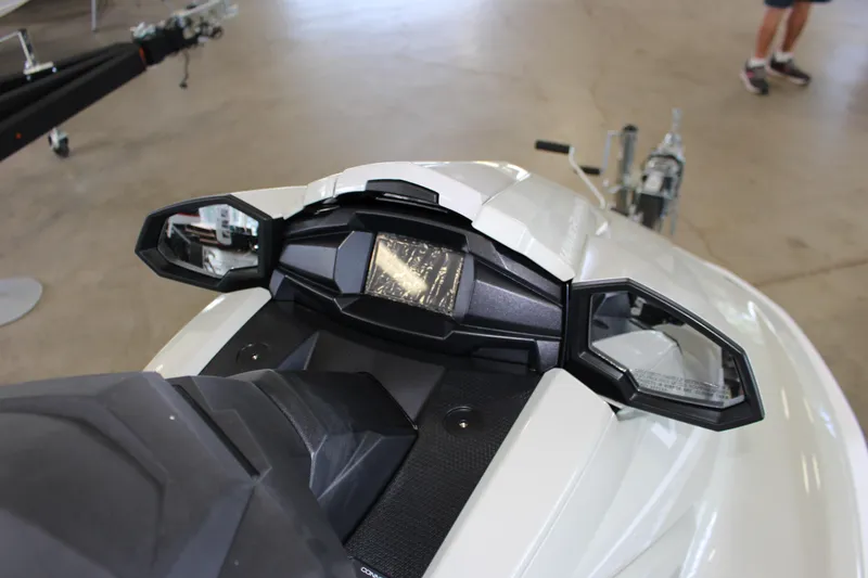 Slide: The Image of 2025 Yamaha VX Cruiser HO dashboard with mirrors in a showroom setting. - 6