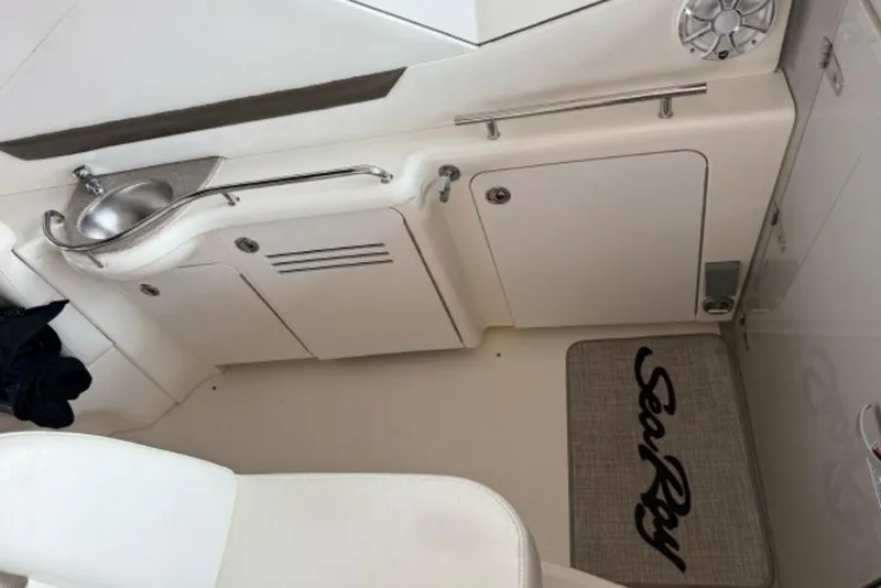 Slide: The Image of Interior of a 2006 Sea Ray 38 Sundancer yacht with sink and storage. - 17
