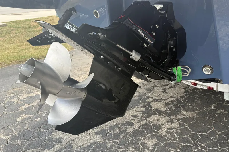Slide: The Image of 2026 Monterey 27 SD Elite boat with MerCruiser outdrive and propeller. - 5