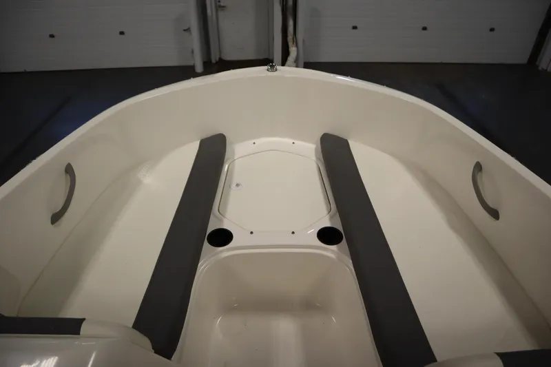Slide: The Image of 2021 Bayliner 16 Element boat interior with seating and cup holders. - 11
