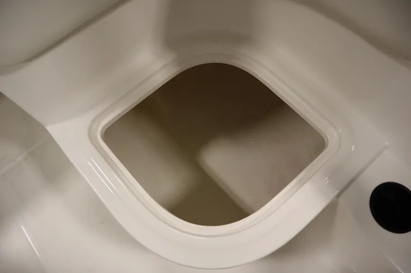 Slide: The Image of 2021 Bayliner 16 Element boat storage compartment, white interior detail. - 26